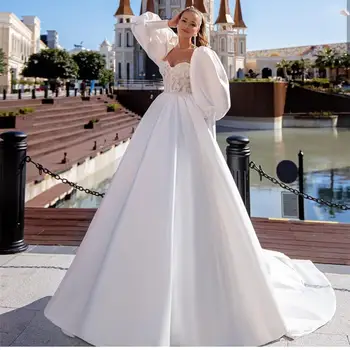 Vestuvinė Suknelė Prabanga 2021 Baltos Spalvos Elegantiškas Satino Kamuolys Chalatai Brangioji Ilgio Sluoksniuotos Rankovėmis Nėrinių Appliques Royal Traukinio Princesė Gracefu